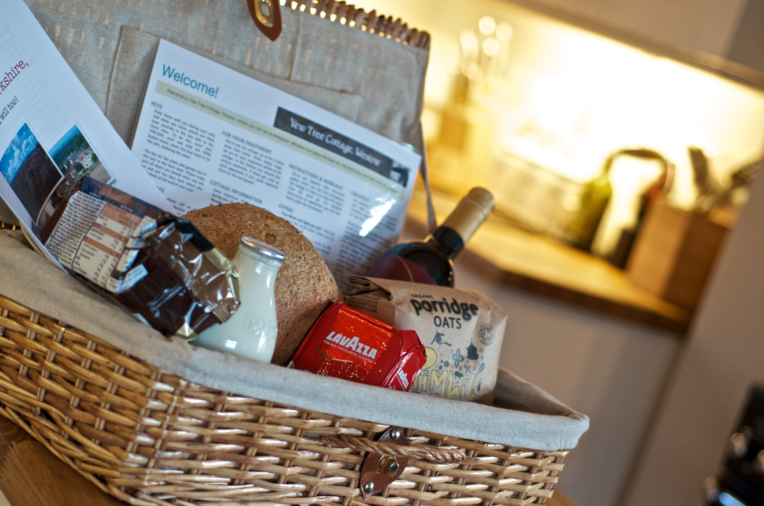 Locally sourced welcome hamper with bread, wine and coffee at Yew Tree Cottage Westow