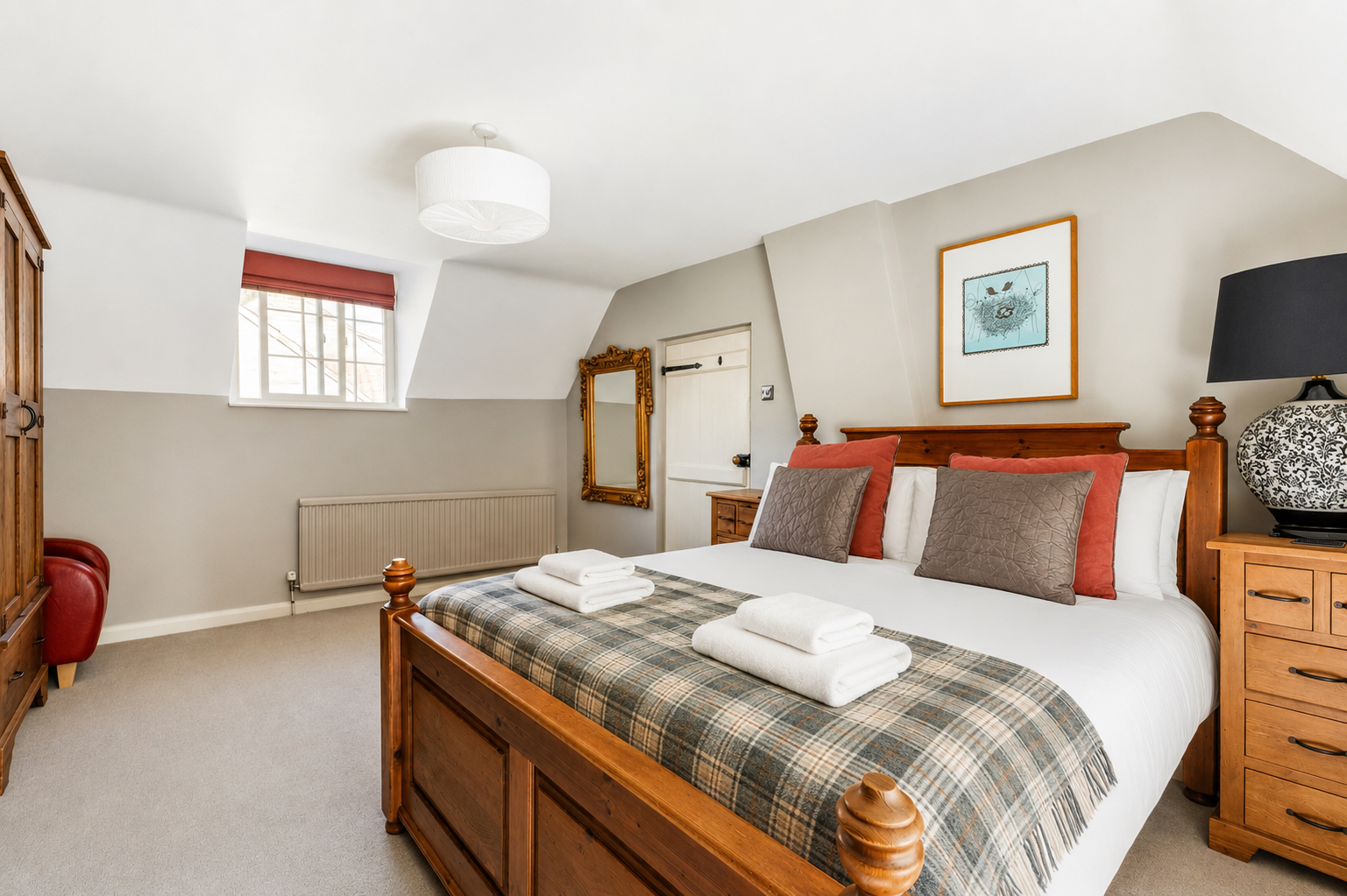 Master bedroom with king size bed and plush linen at Yew Tree Cottage Westow